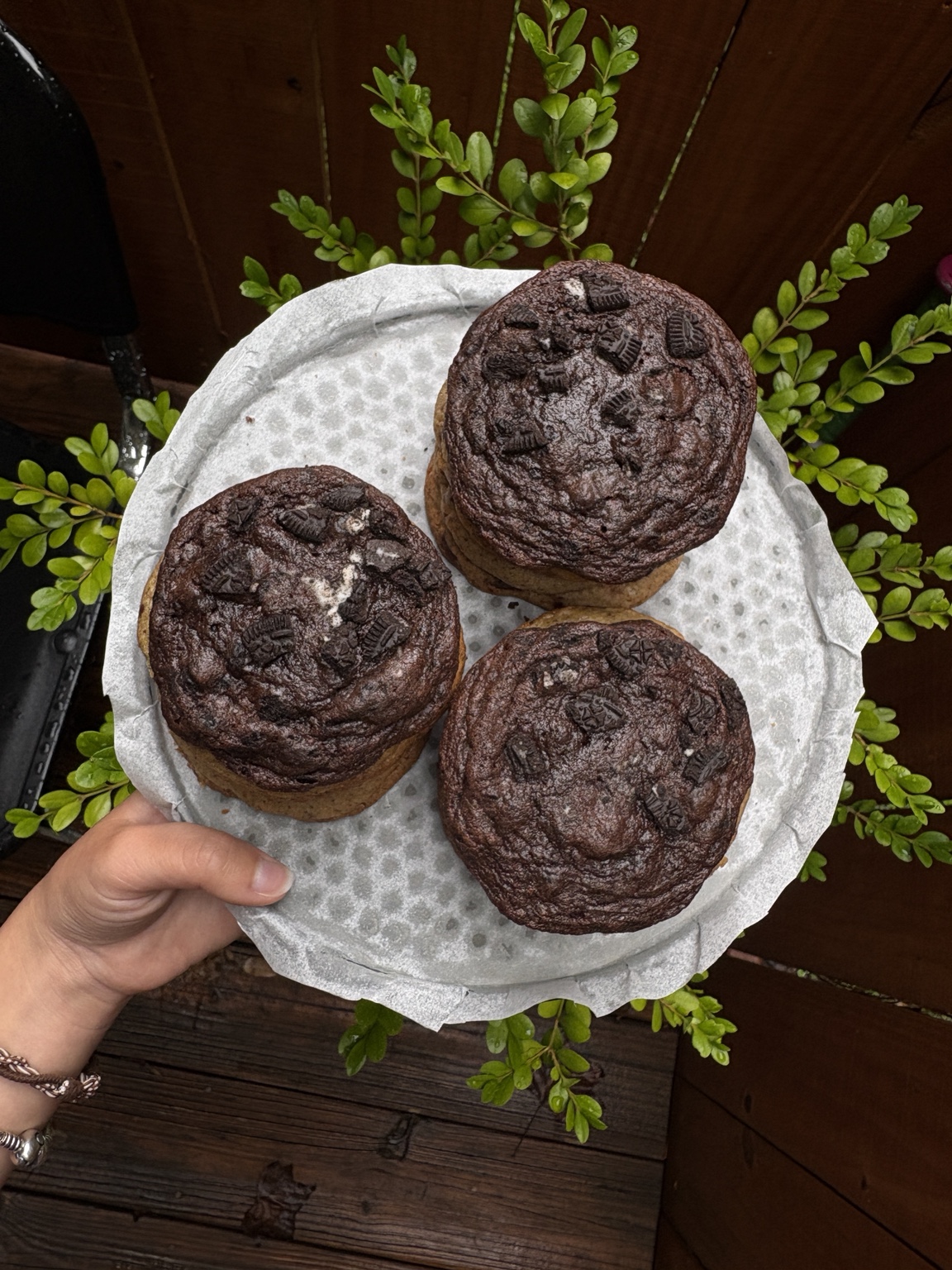 Brulett's larger chocolate cookies with Oreo pieces, stacked on a tray